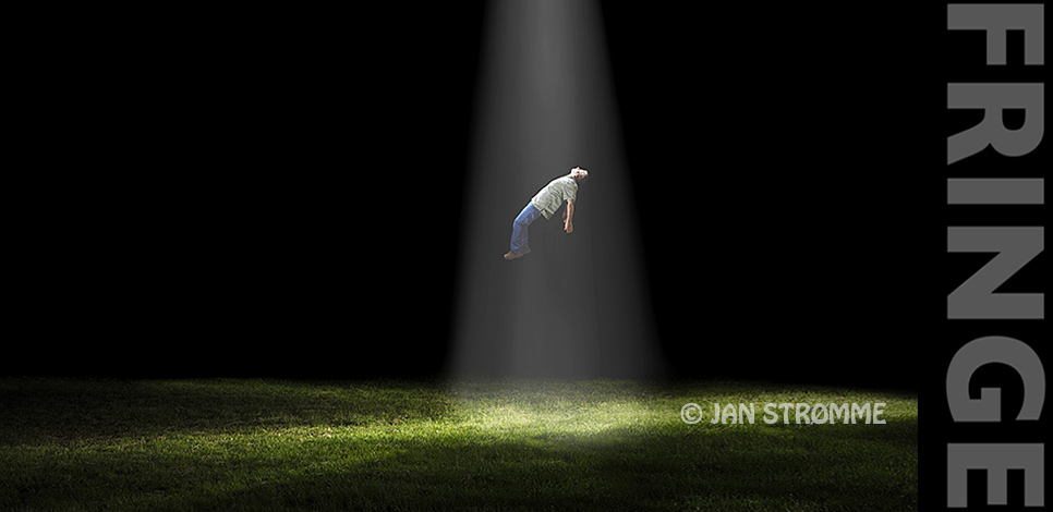 A surreal photograph of a man floating being abducted in a shaft of light at night.