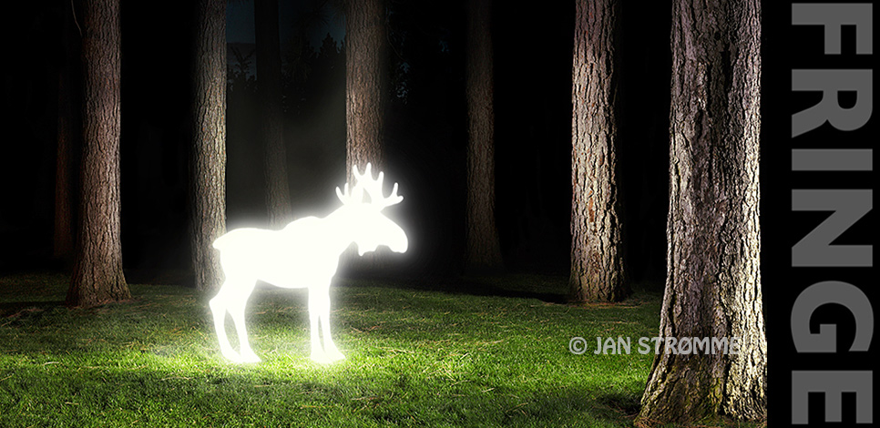 Surreal glowing moose in a forest at night