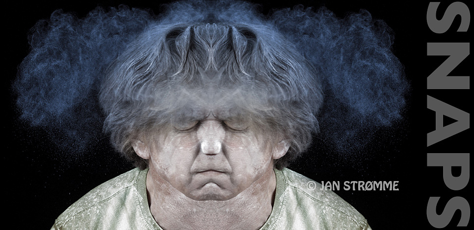 Surreal portrait of a construction worker shaking his head in a dusty environment