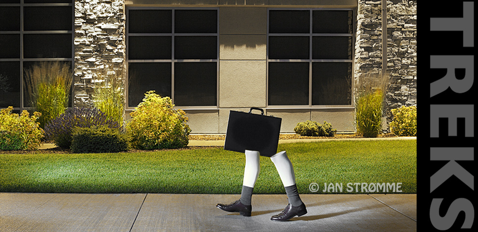 Manikin legs walking on sidewalk with briefcase